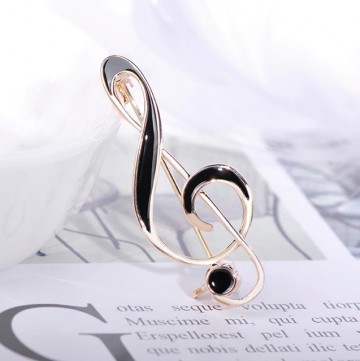 Broche speld vioolsleutel goud zwart