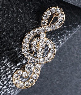 Broche vioolsleutel glinster goud