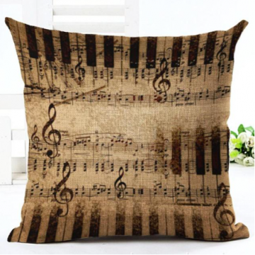 Kussenhoes bruin toetsen vioolsleutels