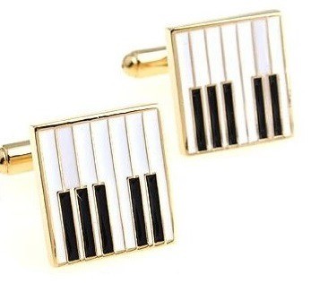 Manchetknopen pianotoetsen goud