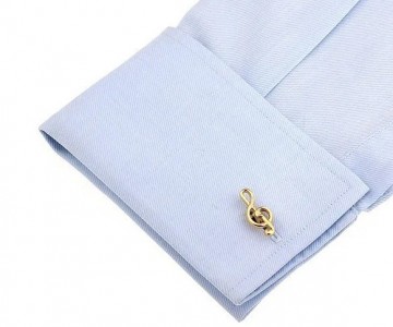 Manchetknopen vioolsleutel goud op stof