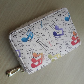 Pasmapje creme meerkleurig muziektekens 2