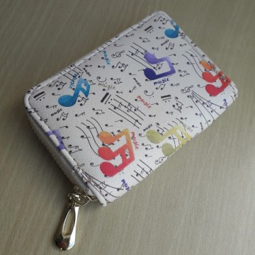 Pasmapje creme meerkleurig muziektekens 3