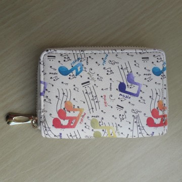 Pasmapje creme meerkleurig muziektekens