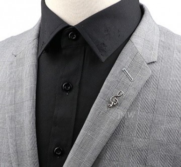 Rever pin vioolsleutel zilver op jasje