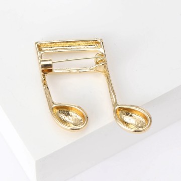 Speld muzieknoten goud achterkant