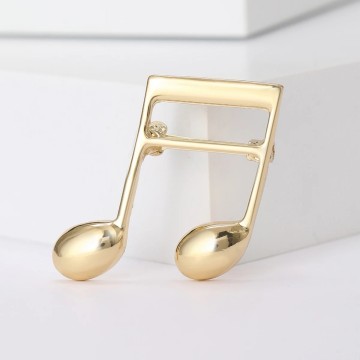 Speld muzieknoten goud